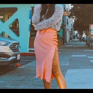 A cute cropped multi-colored long sleeve sweater!